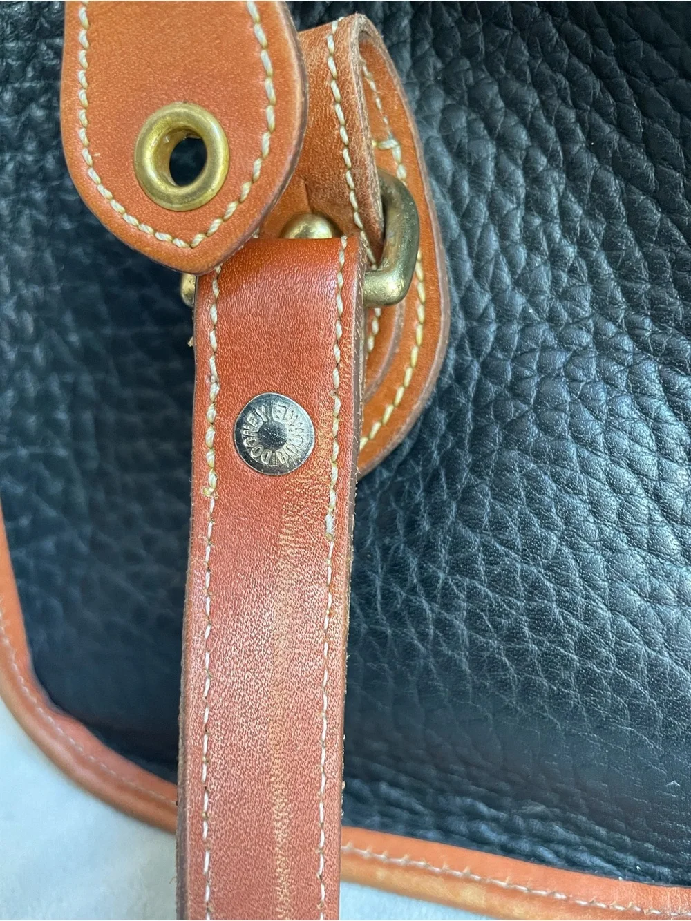 Dooney & Bourke Vintage All Weather Leather Handbag Black Tan Duck Logo AWL
